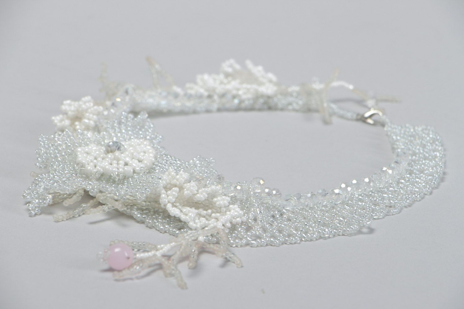 Handmade festive necklace woven of white seed and glass beads with flower photo 3
