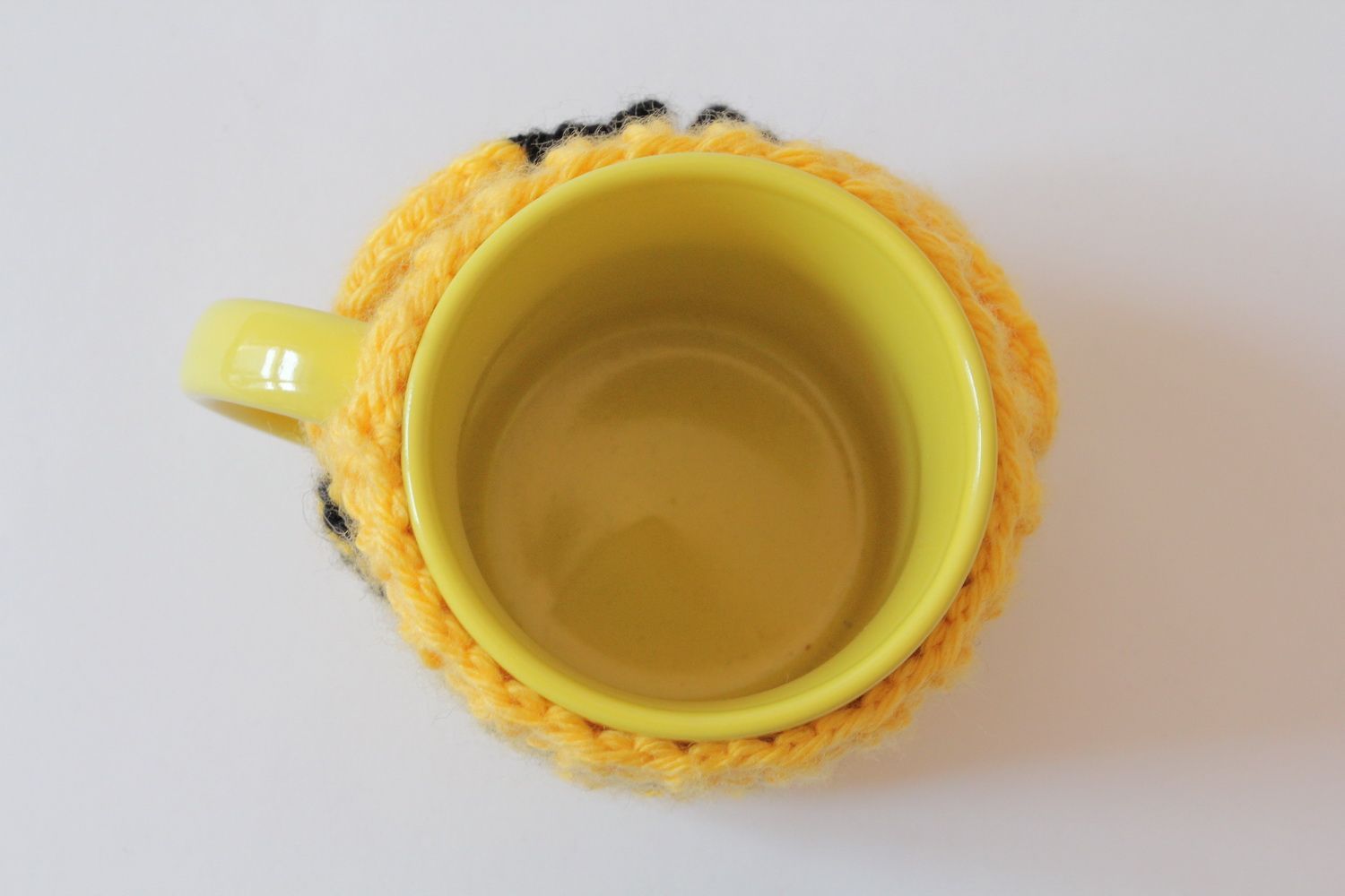 Cup in yellow color with handle and knitted bee colors' cover photo 2