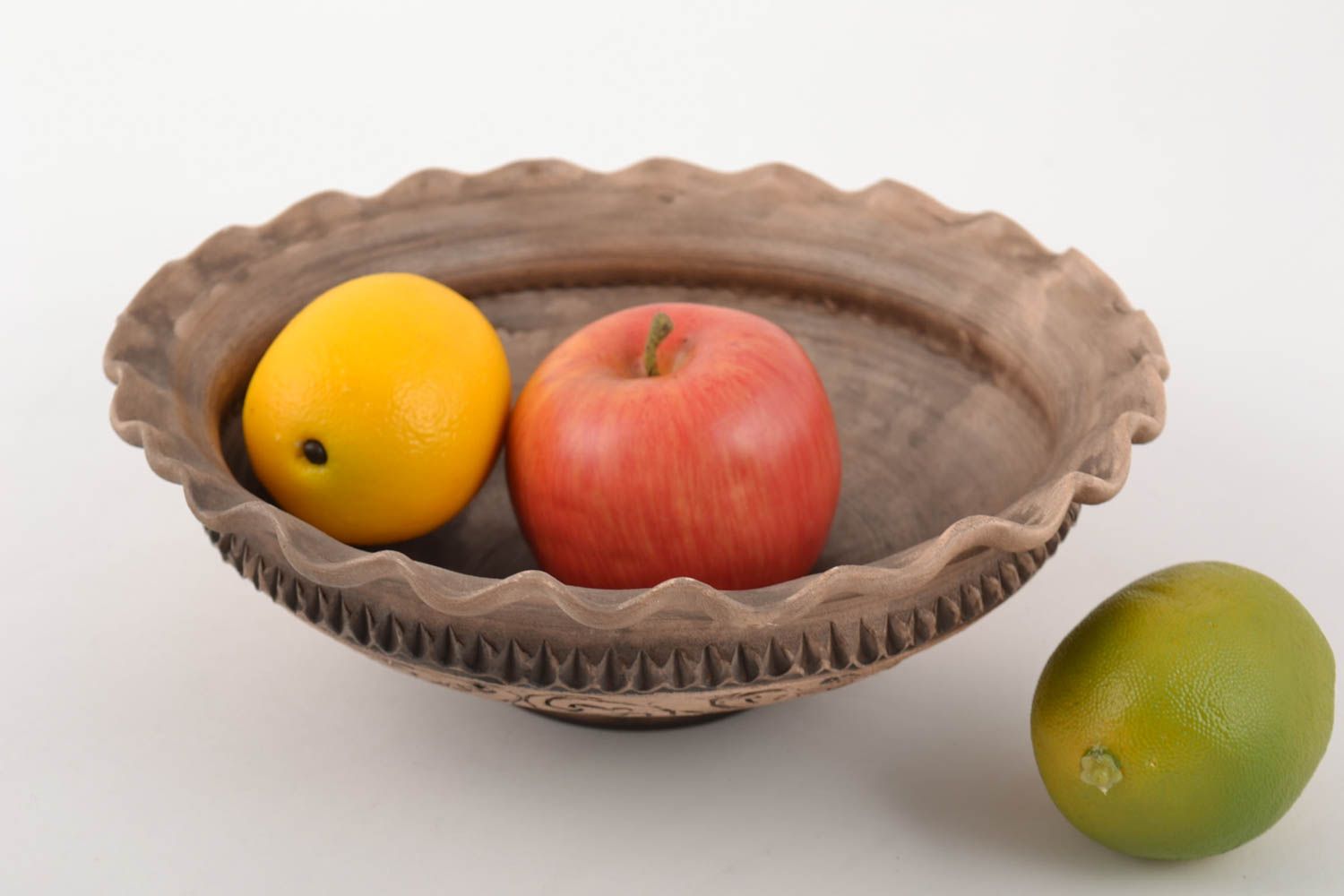 Handmade decorative ceramic bowl with wavy edges for fruit for 1 l photo 1