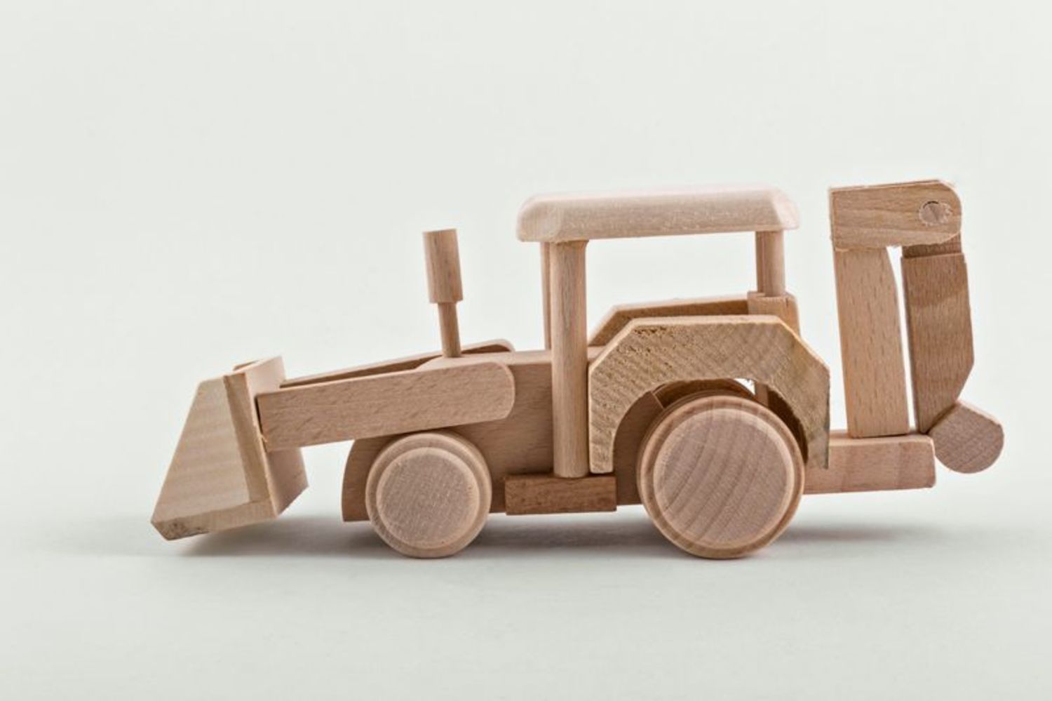 Деревянная игрушка Трактор фото 2