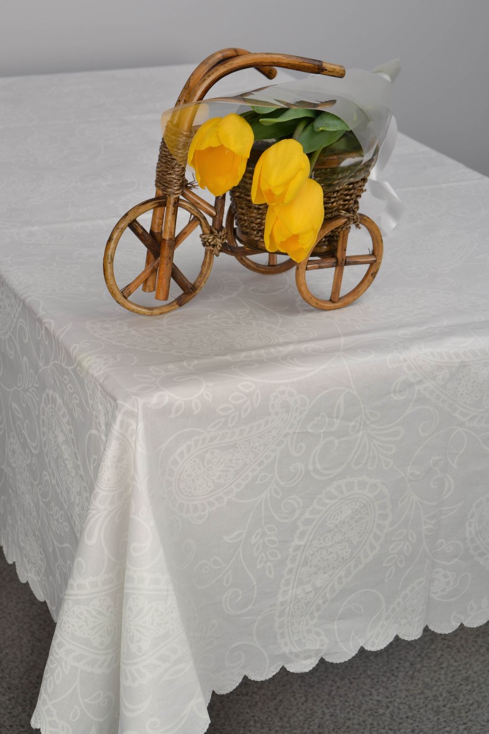 White ornamented tablecloth photo 1