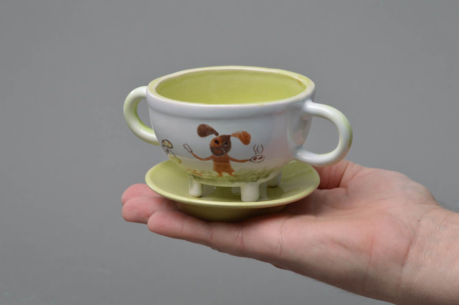 Handmade porcelain 5 oz kid drinking cup with two handles, legs, and a saucer photo 4