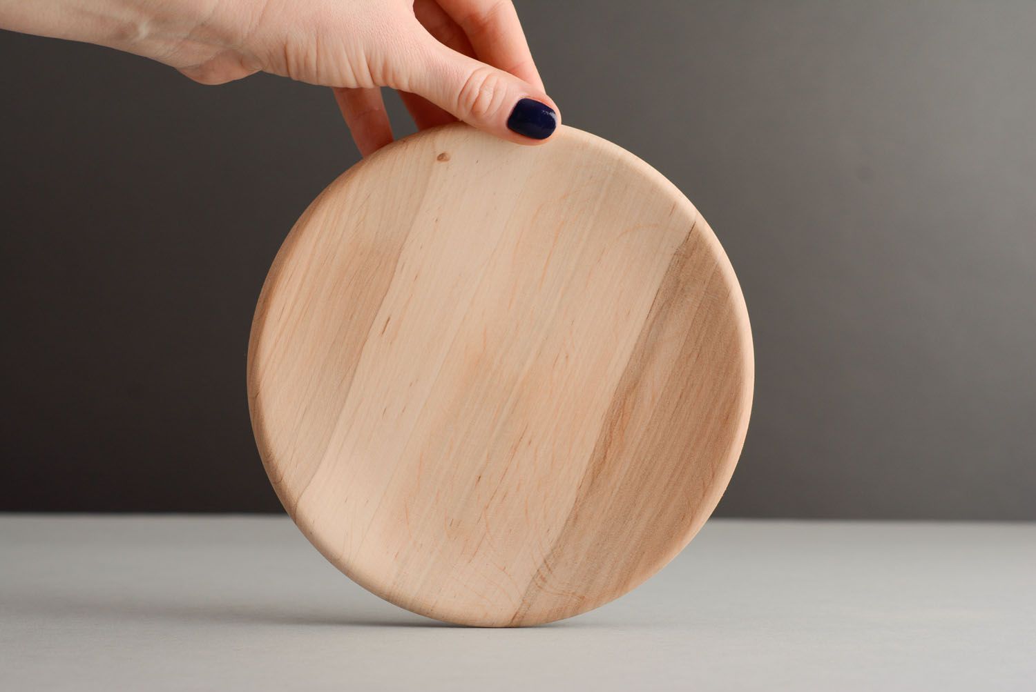 Base de madera hecha a mano con forma de plato foto 2
