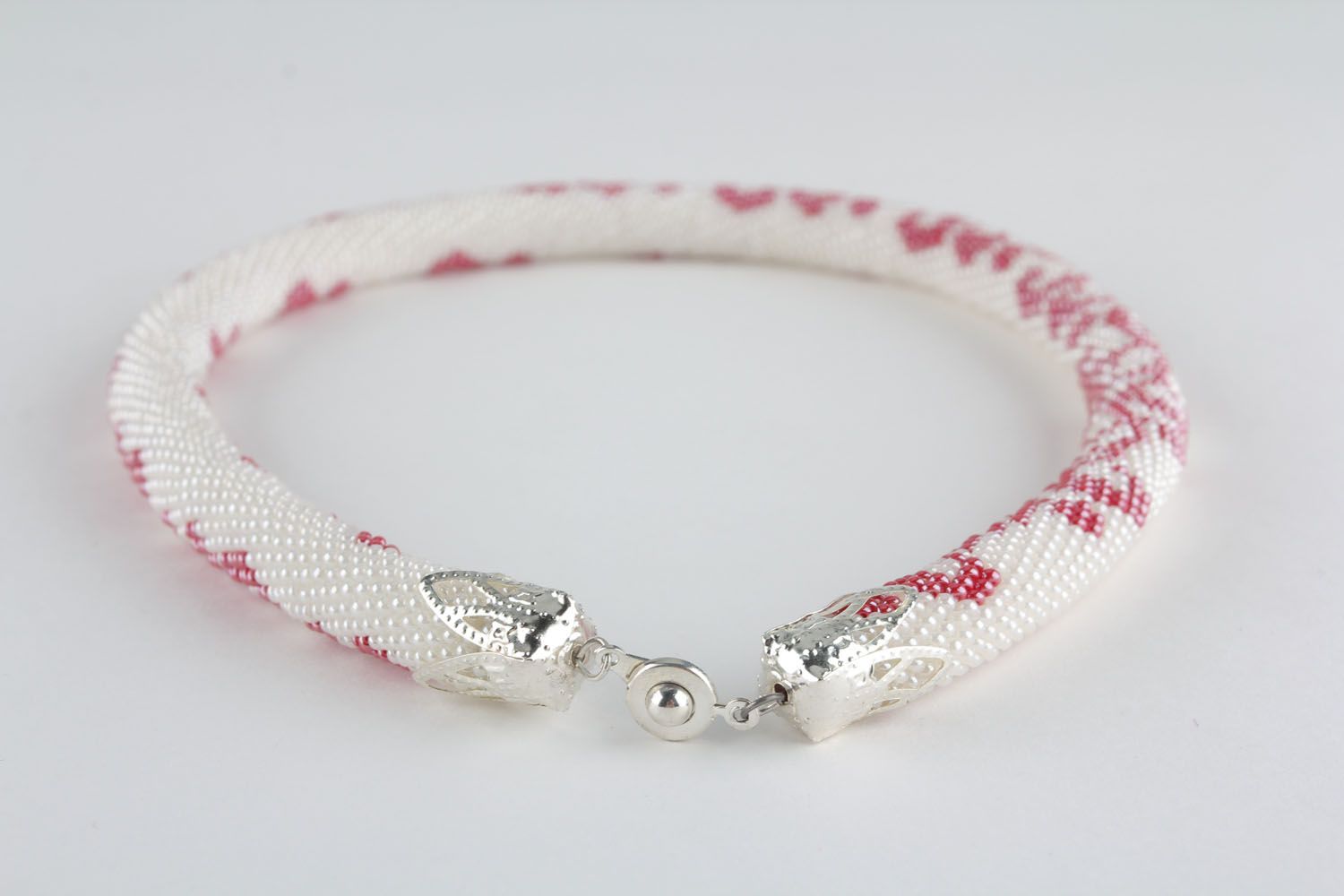 Homemade white beaded cord necklace photo 1