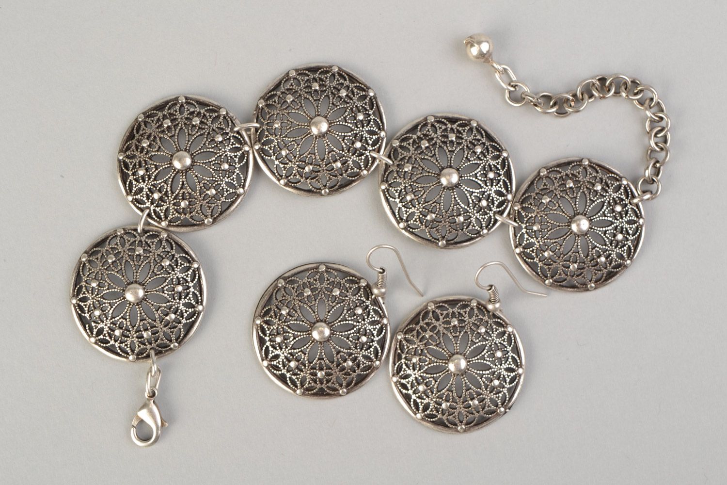 Set of handmade hypoallergenic metal wrist bracelet and dangling earrings photo 3