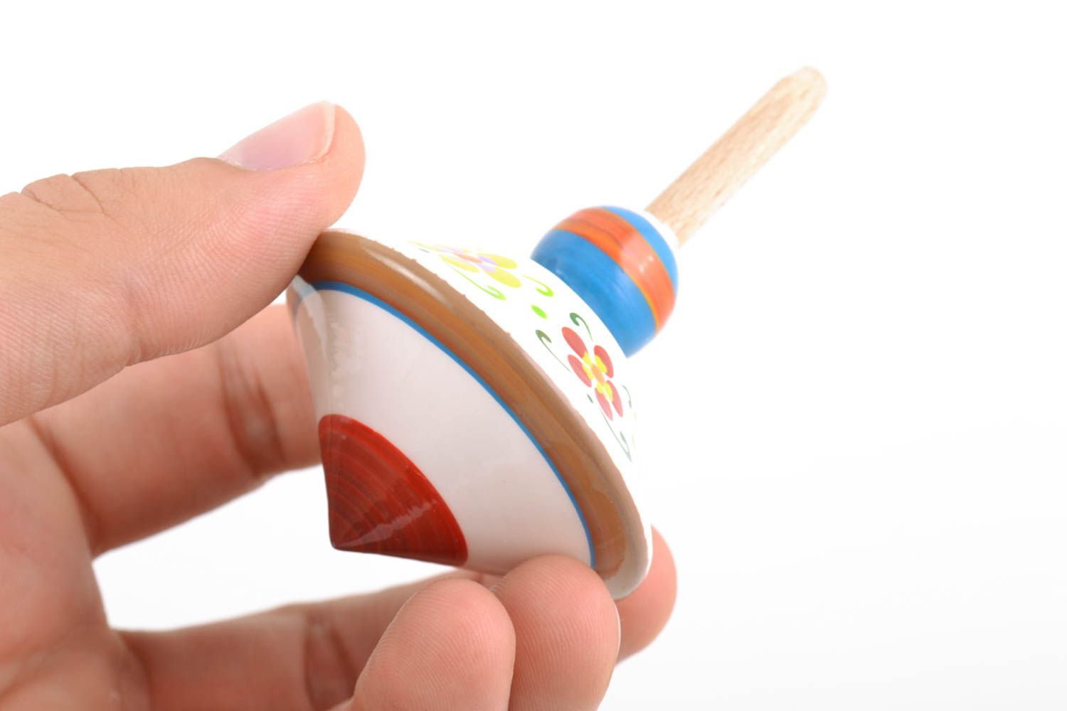 Weißes Spielzeug Kreisel aus Holz bunt mit öko reinen Farben bemalt handgemacht foto 2