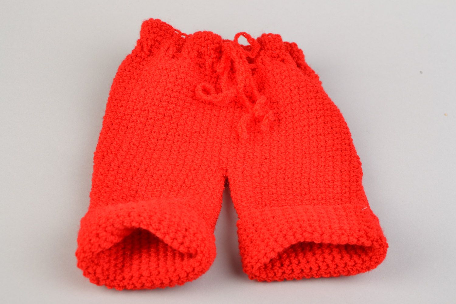 Handmade crocheted stylish red baby pants for kids made of acrylic threads photo 3