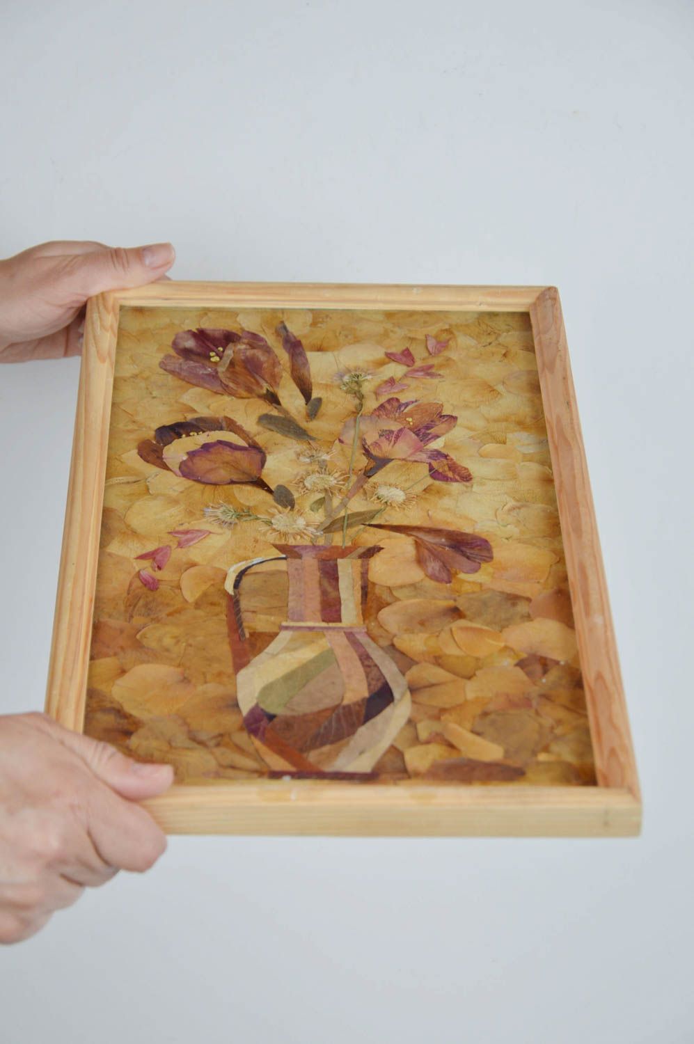 Beautiful homemade picture on fabric basis with dry leaves and flowers Tulips photo 3