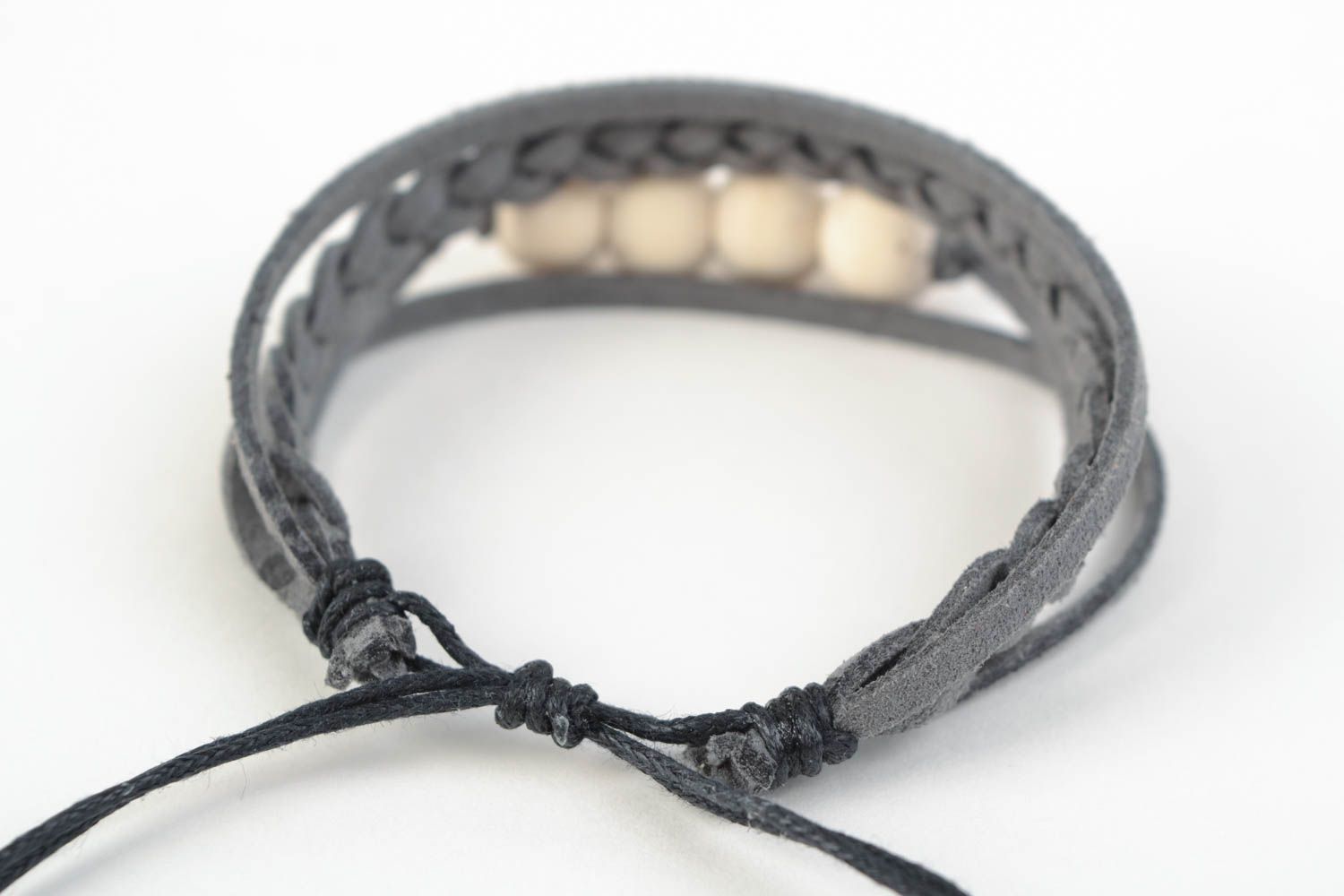 Beautiful designer handmade women's woven suede cord bracelet with beads photo 4
