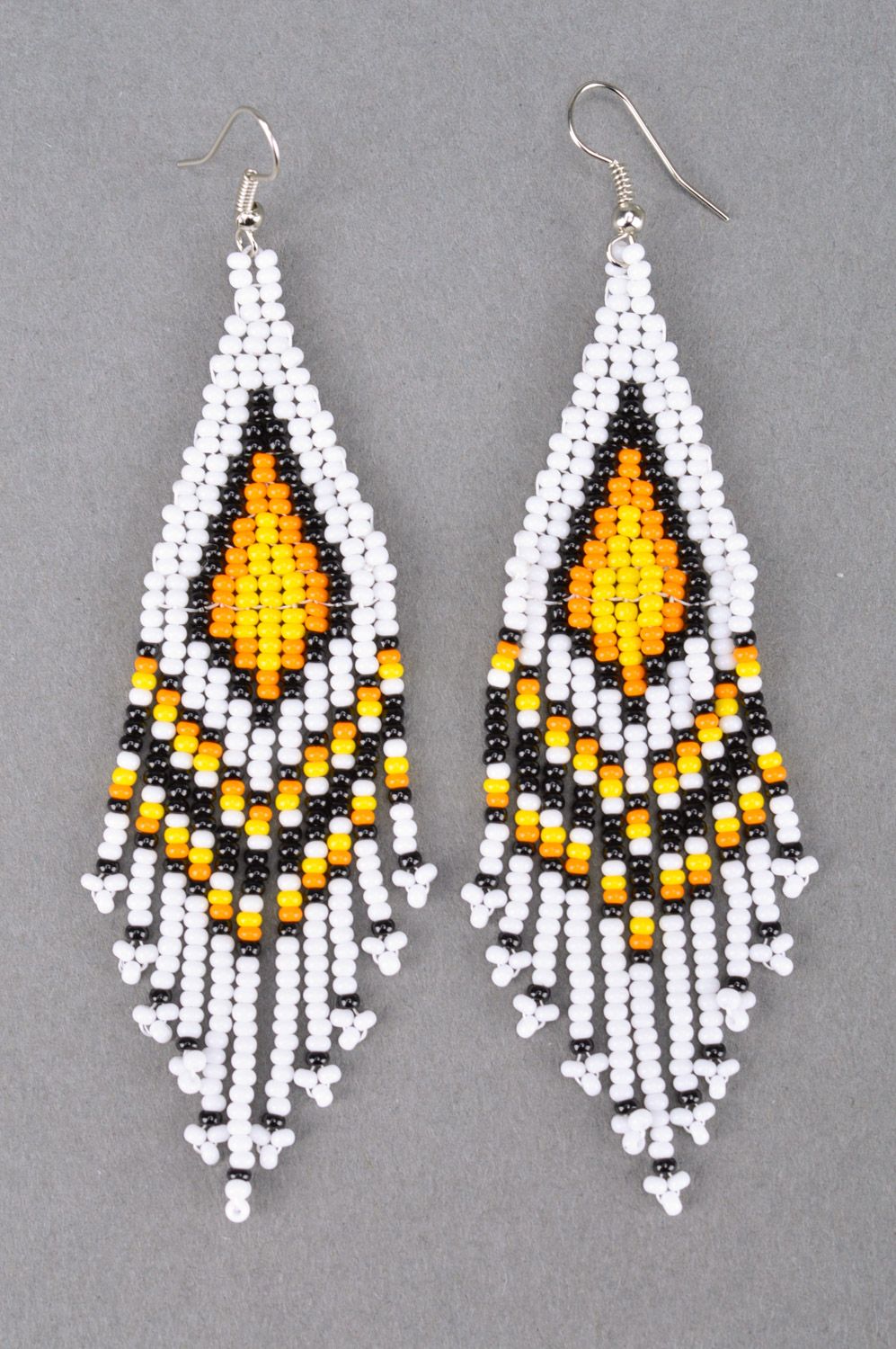 Unusual stylish light handmade earrings woven of Czech beads with fringe photo 2