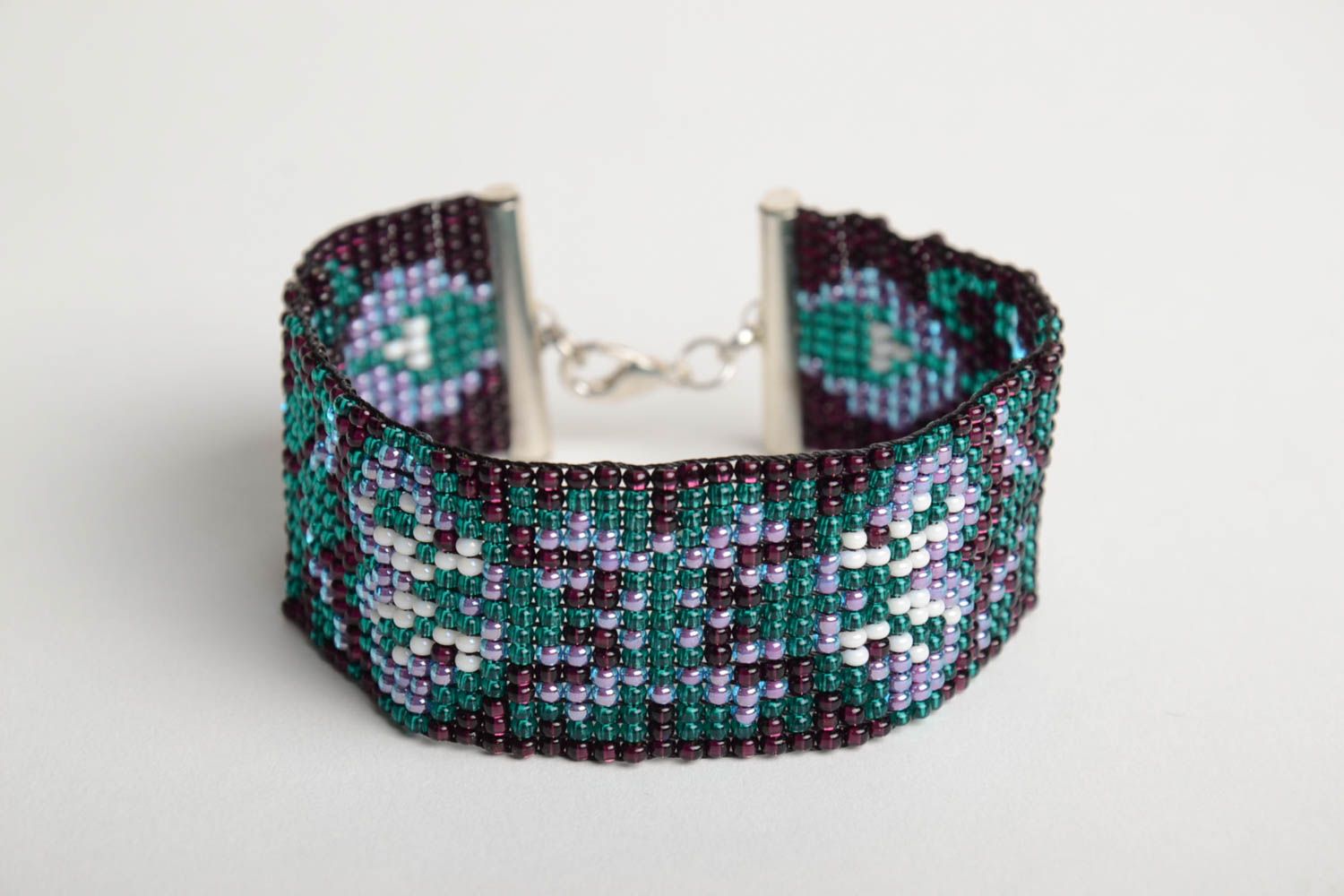 Dark beads wide cuff women's wrist bracelet with dark floral ornament photo 3