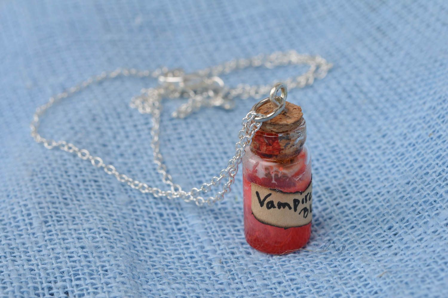 Handmade stylish cute red pendant in shape of glass jar with epoxy resin photo 3