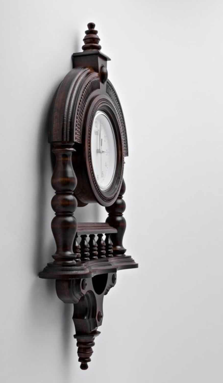 Wooden wall clock with pillars photo 3