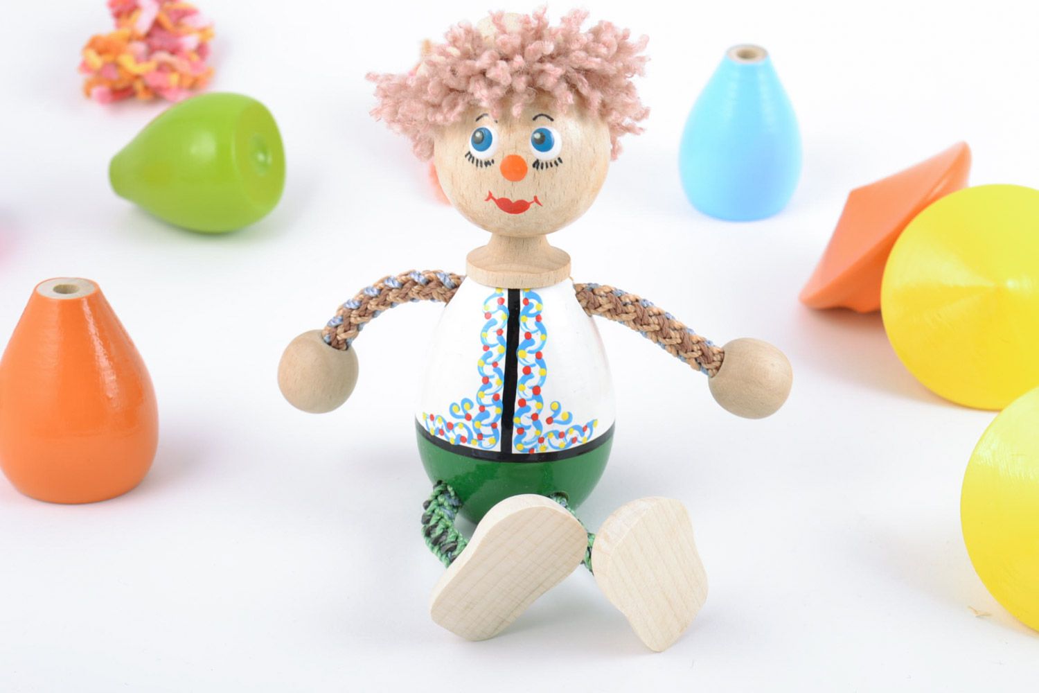Small wooden toy boy painted with eco friendly dyes handmade for children  photo 1