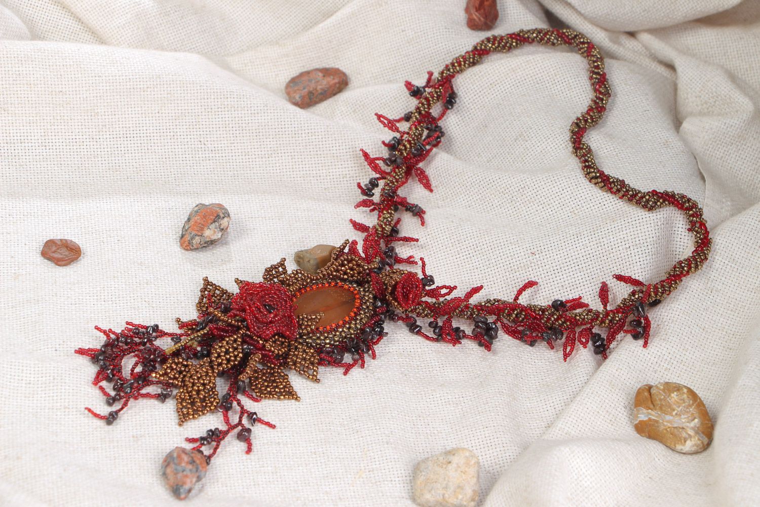 Handmade dark red floral necklace woven of seed beads and natural stones  photo 1
