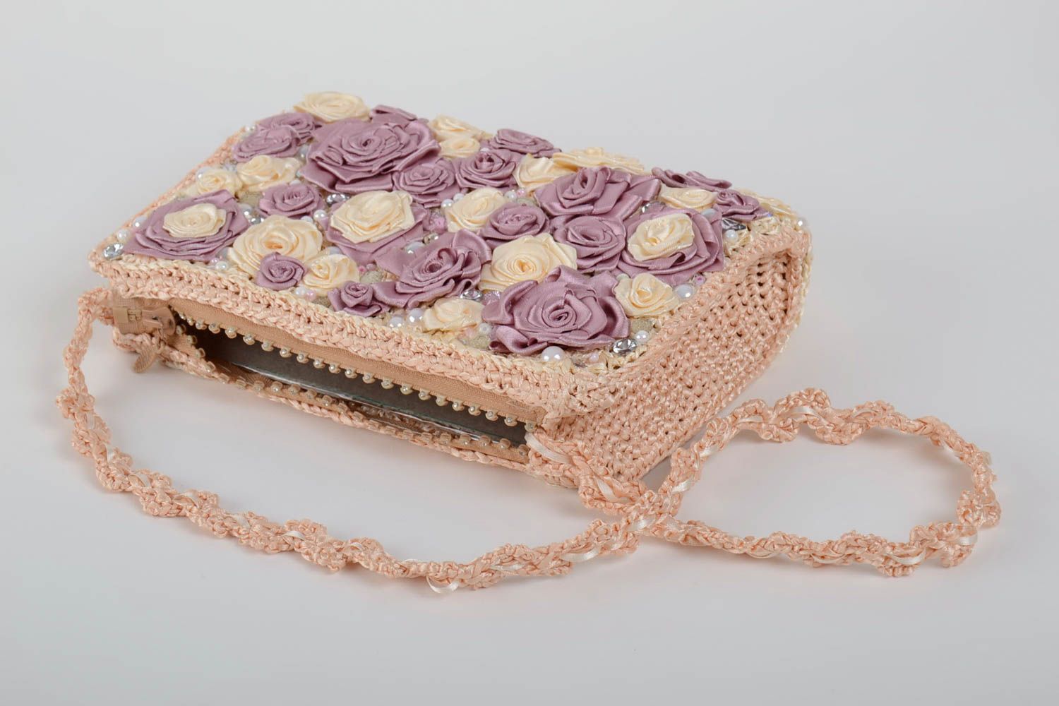 Handmade designer light crocheted clutch bag with pink and violet ribbon flowers photo 2