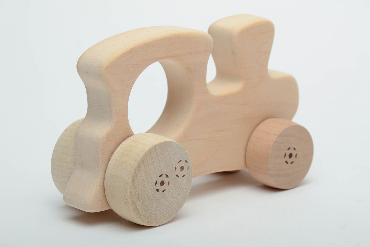 Wheeled toy made of light wood Train photo 4