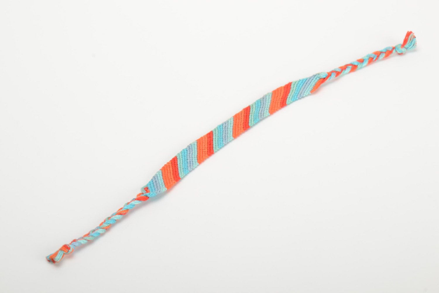 Handmade striped friendship bracelet woven of orange and blue embroidery floss photo 2