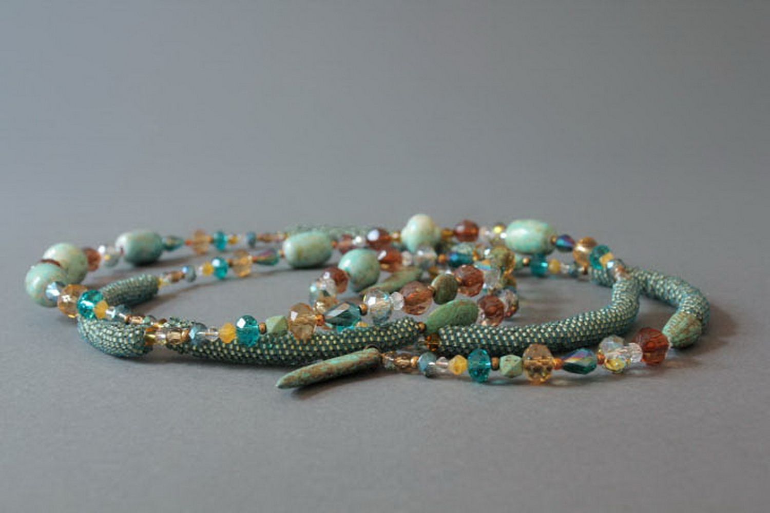 Plaited necklace made from beads with decorative stones photo 8