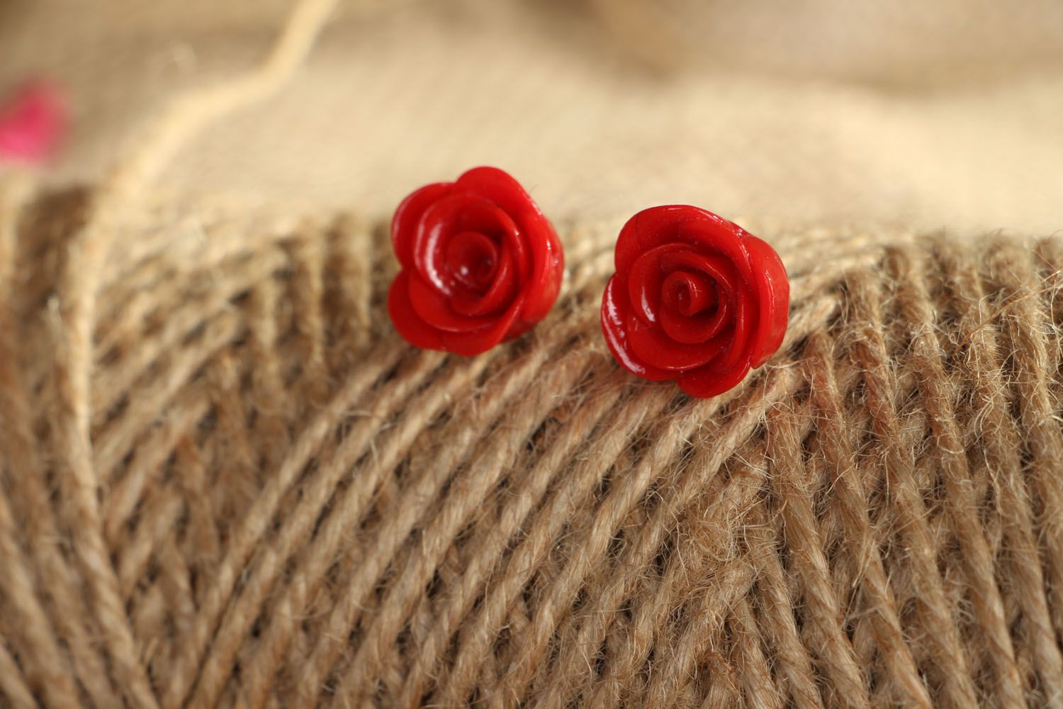 Stud earrings in the shape of red roses photo 4