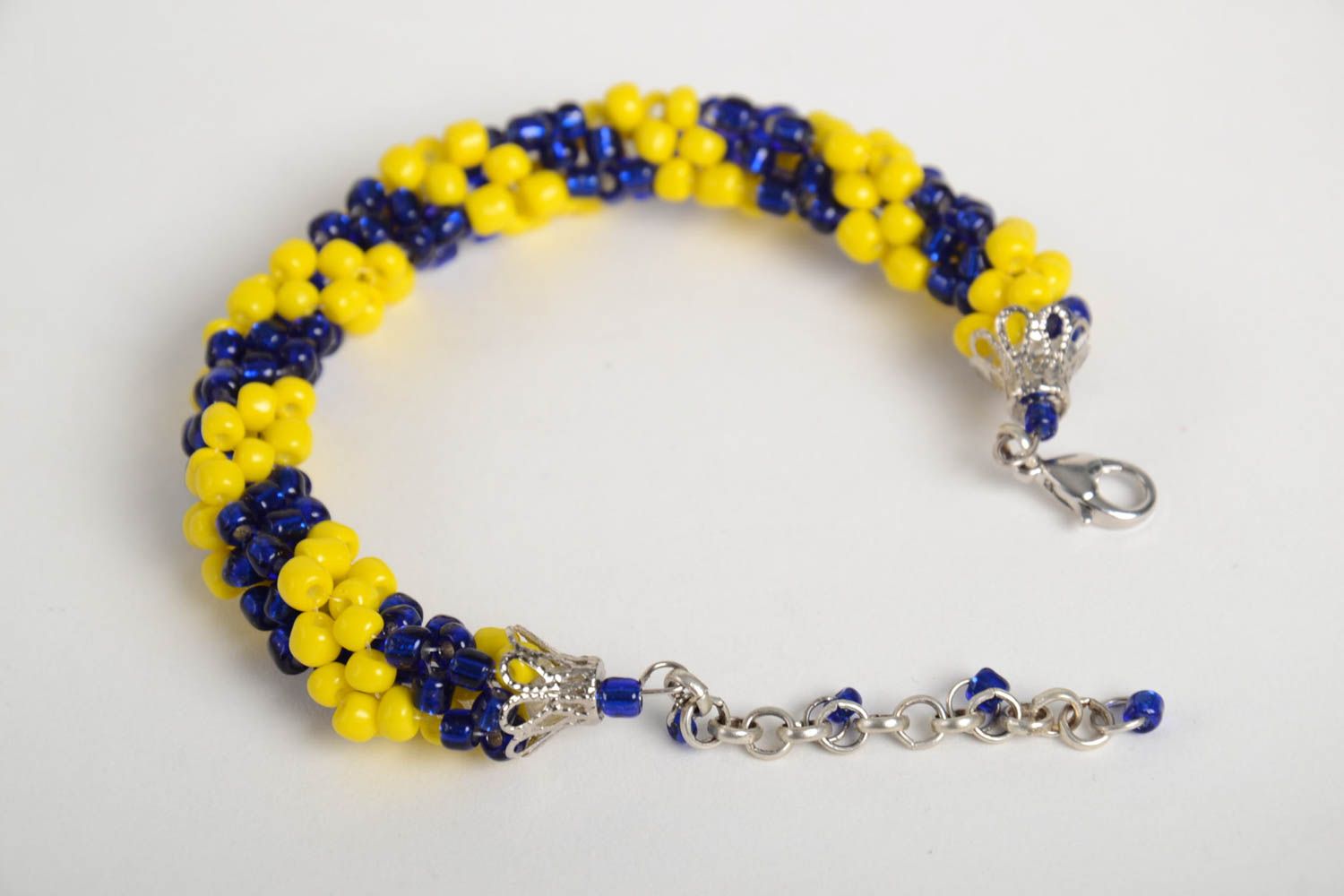 Cord beaded elegant bracelet in yellow and dark blue color photo 3