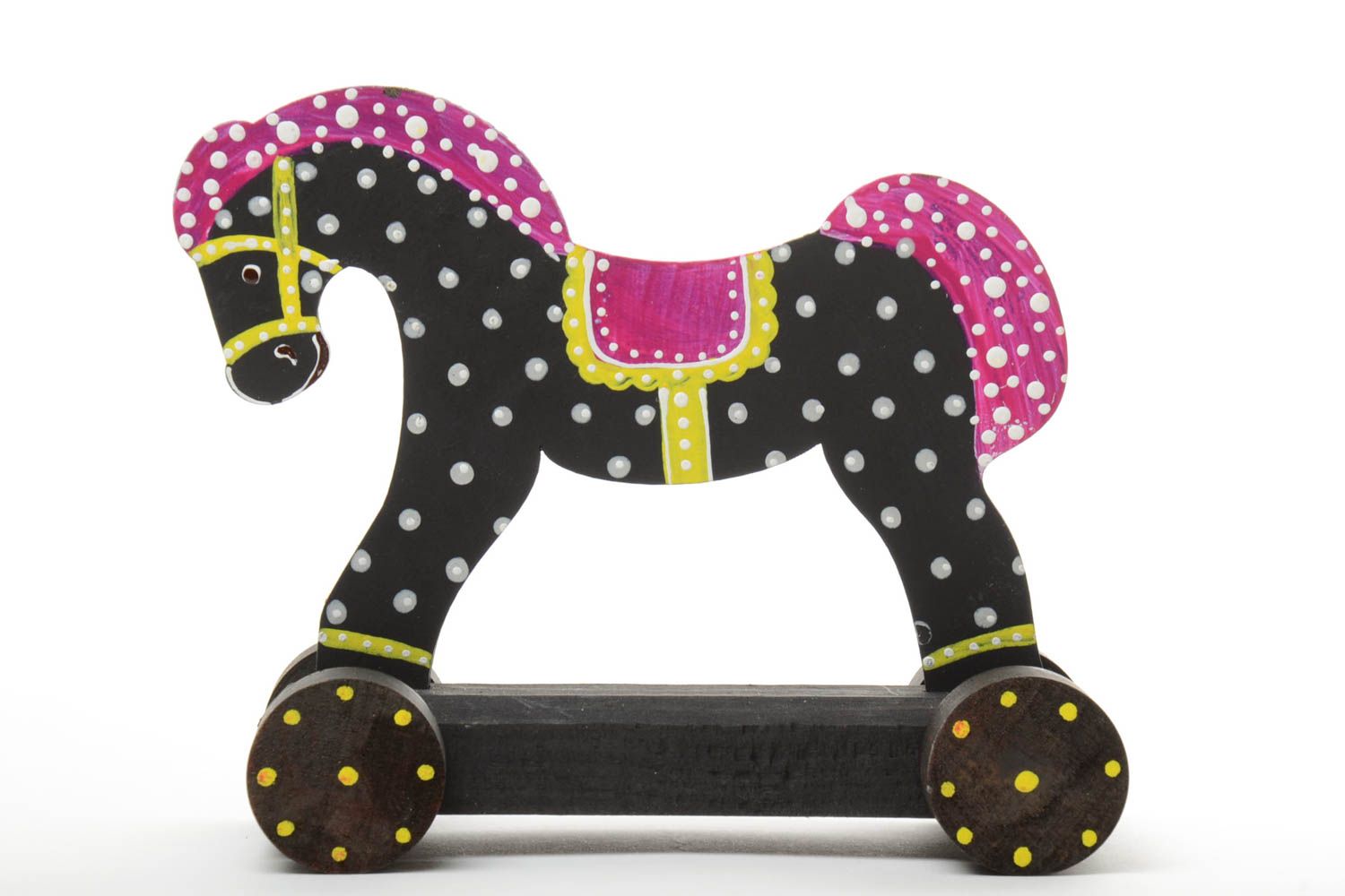 Black and white handmade children's painted wooden wheeled toy horse photo 2