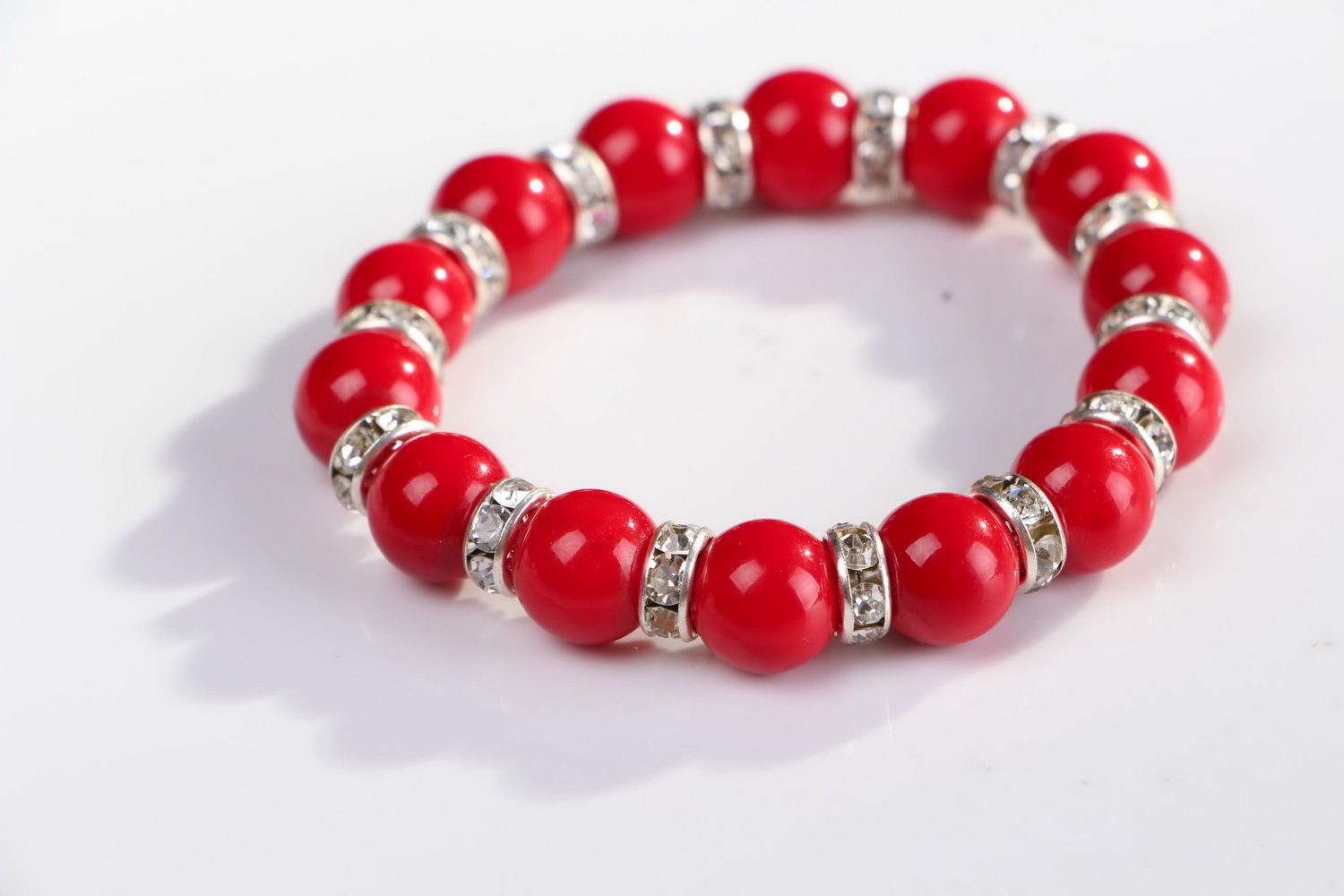 Bracelet made of natural coral on elastic band photo 2