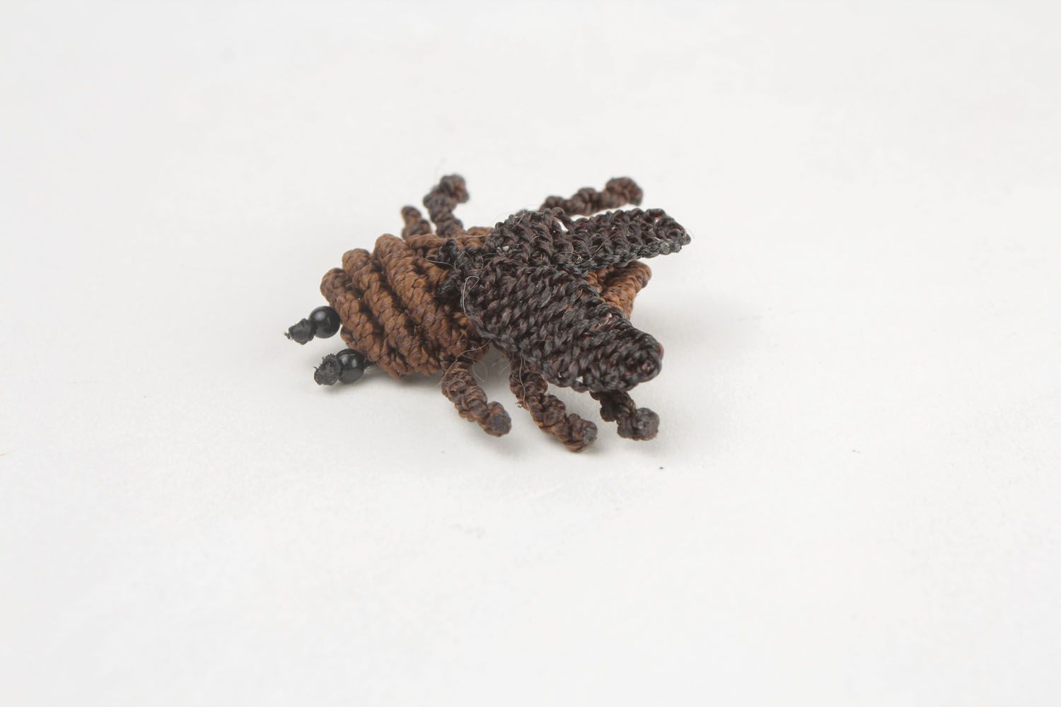 Braided brooch in the form of an insect photo 4