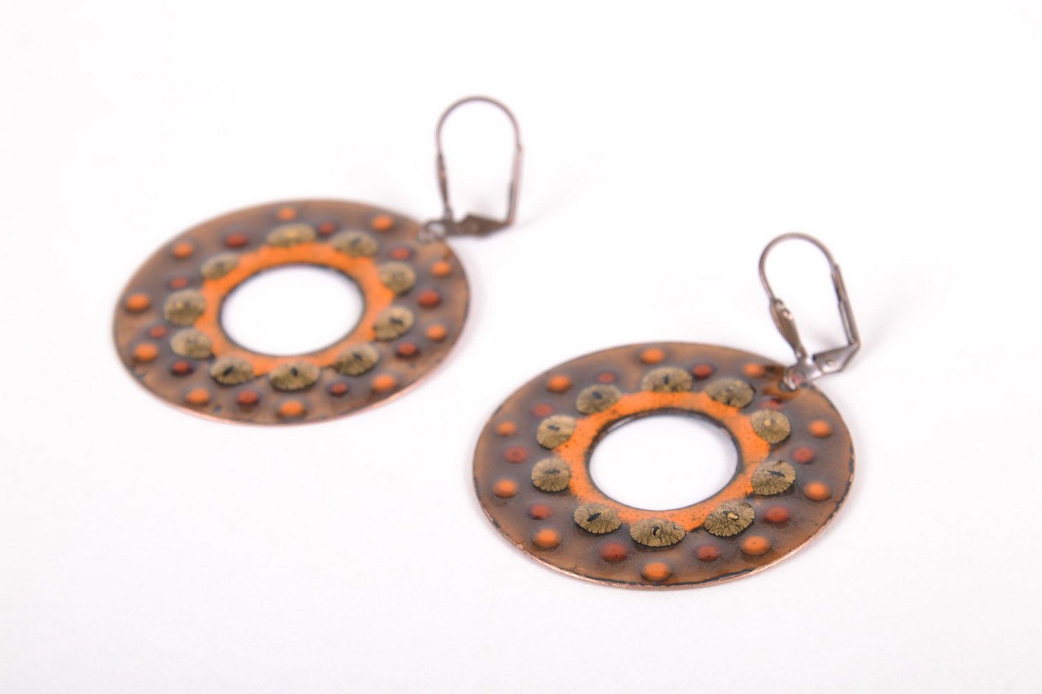 Round earrings made ​​of copper photo 2