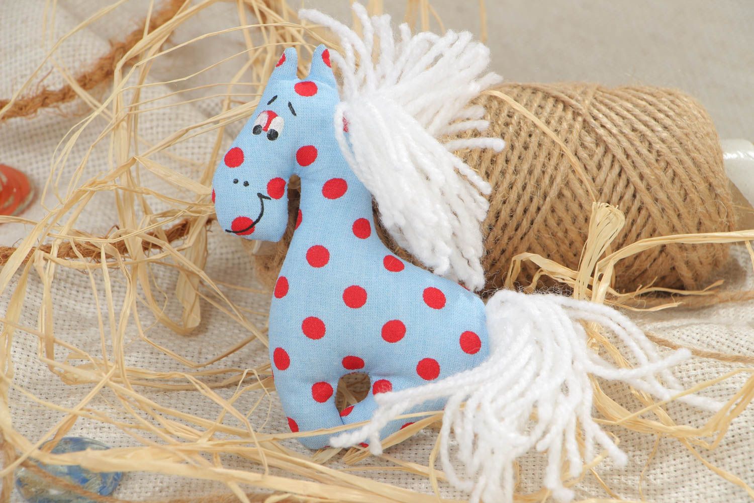 Handmade fridge magnet in the shape of soft toy horse sewn of blue dotted cotton  photo 1