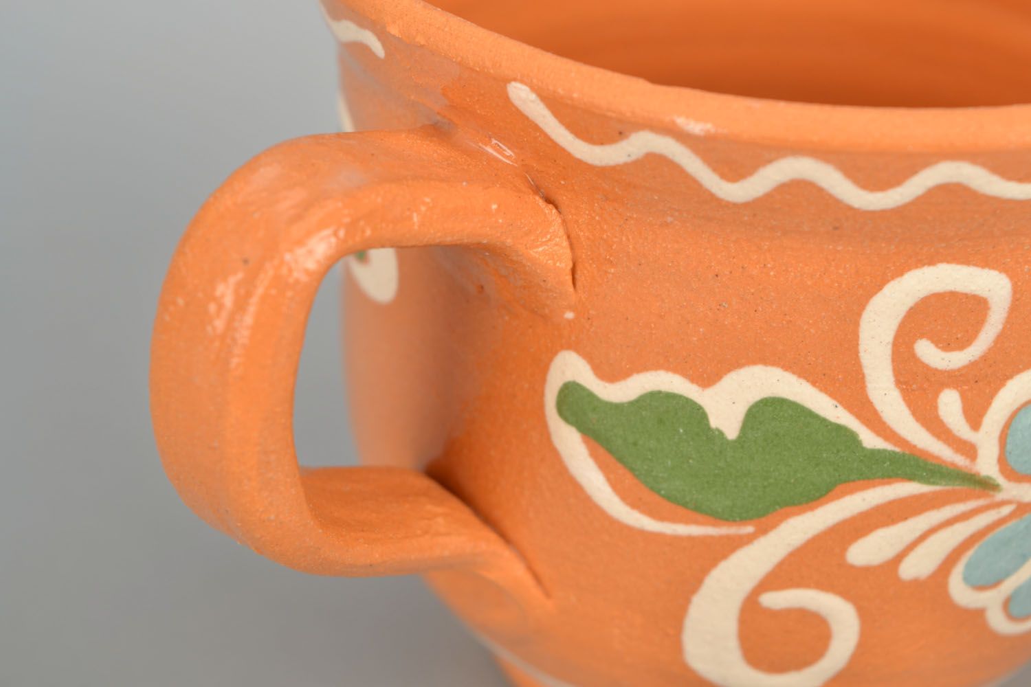 Medium size terracotta color coffee cup with handle and floral design photo 5