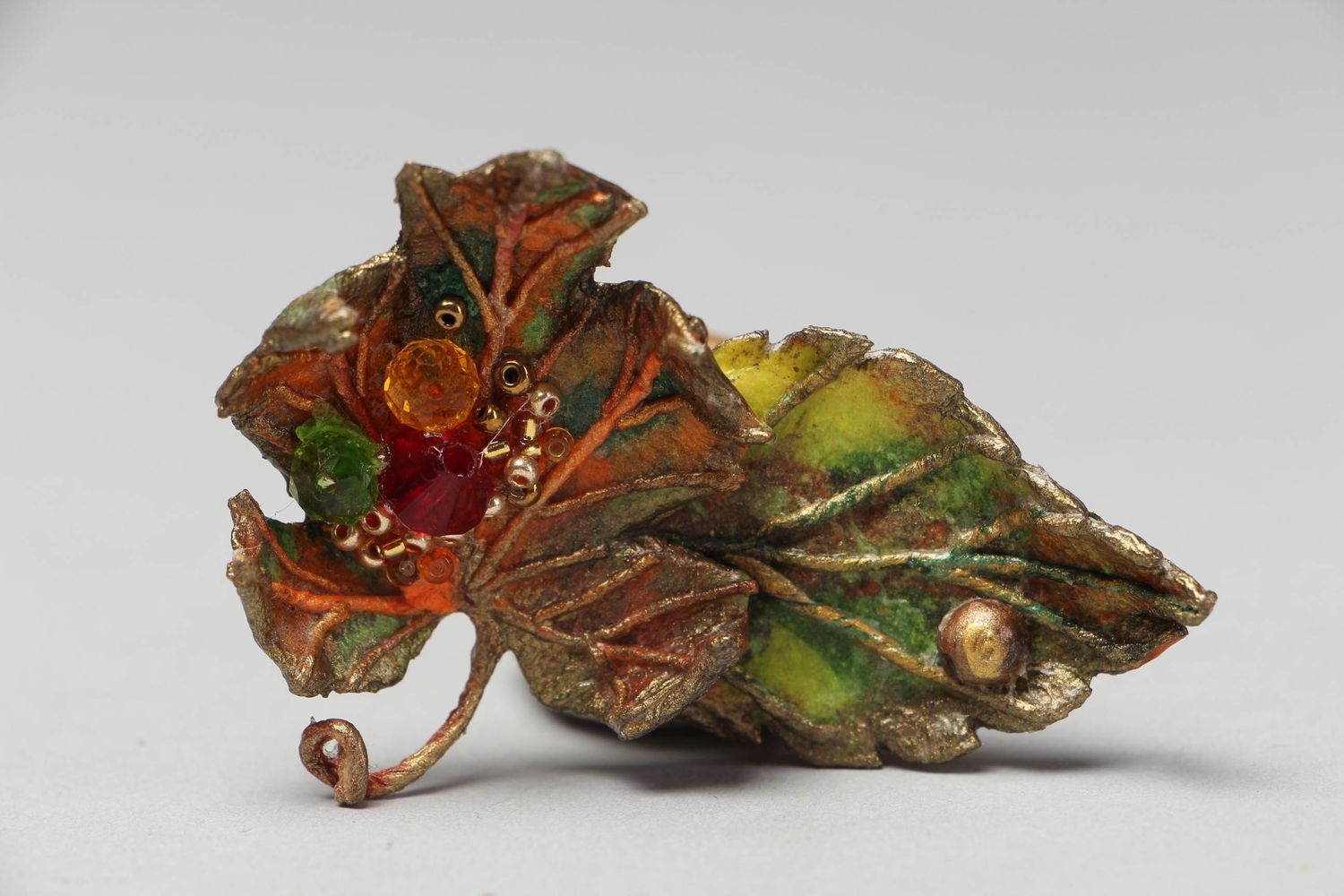 Papier mache brooch in the shape of leaf photo 1