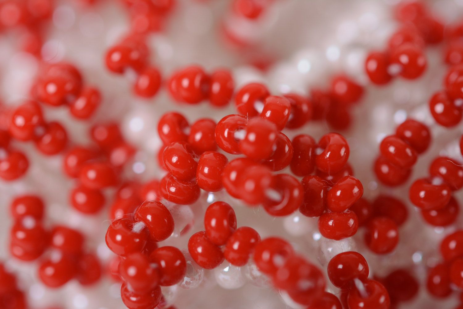 Red and white handmade brooch woven of beads in the shape of volume flower photo 4