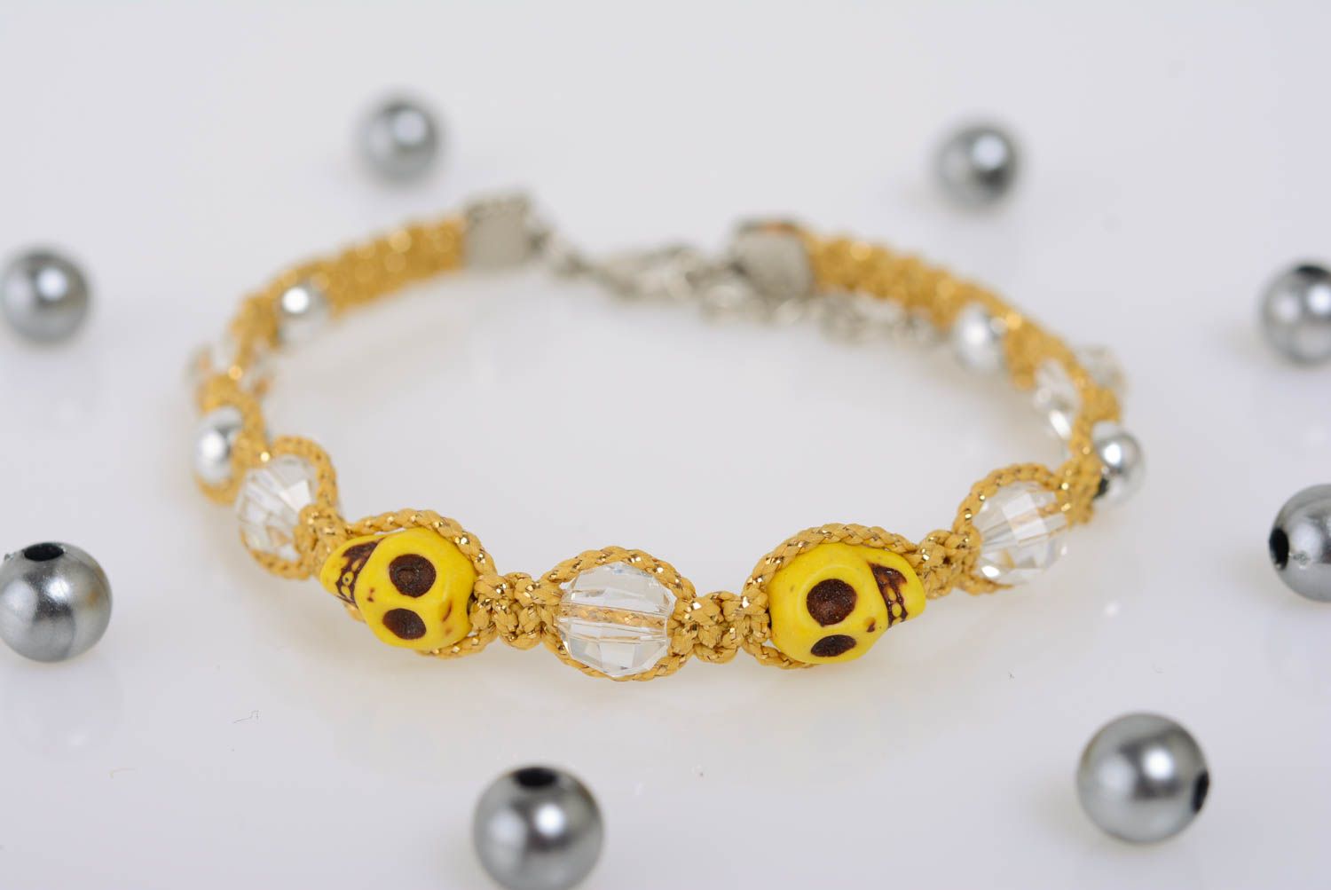 Beautiful yellow handmade macrame woven wrist bracelet with skulls adjustable photo 1