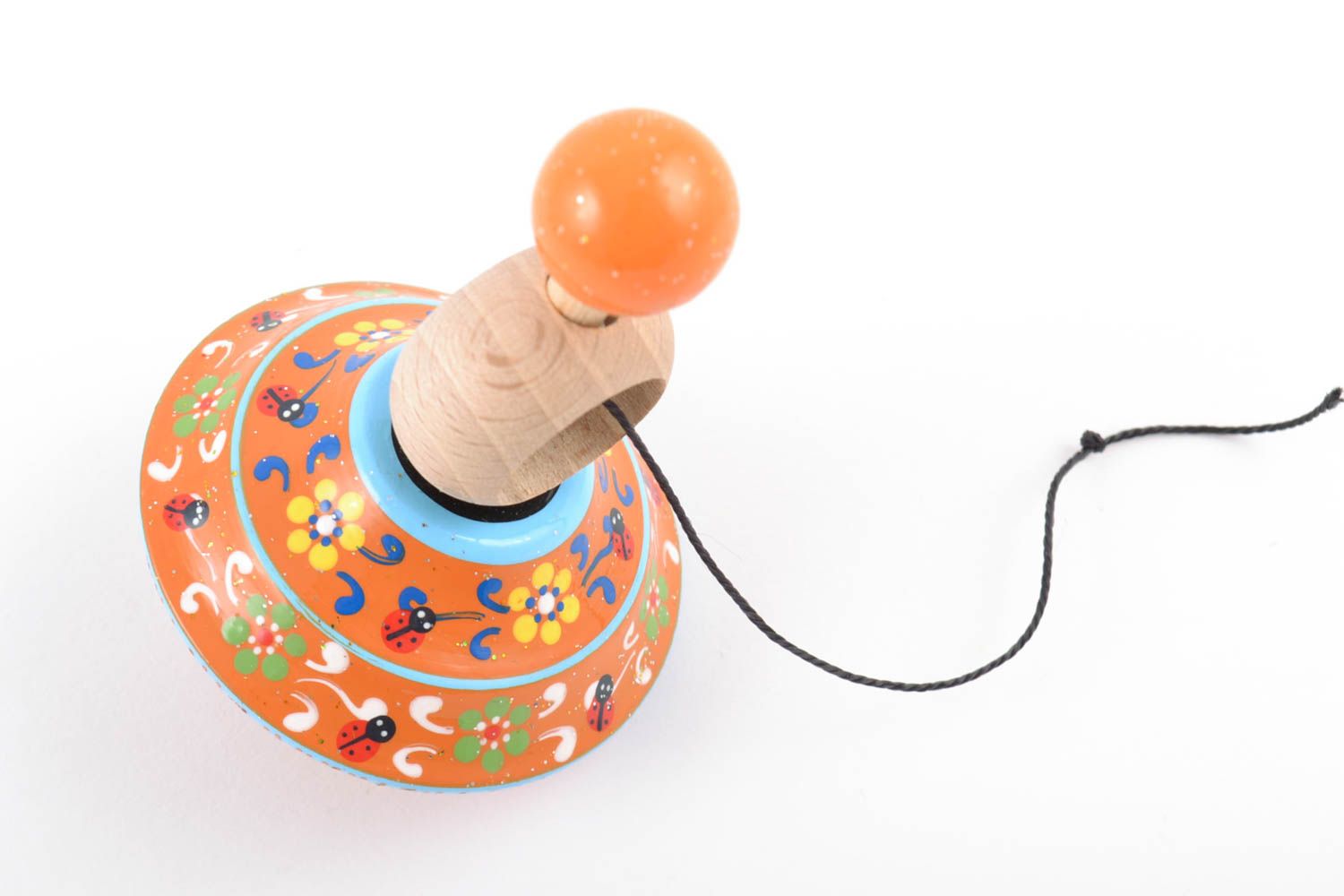 Деревянная игрушка юла с кольцом ручной работы с росписью для детей развивающая фото 3