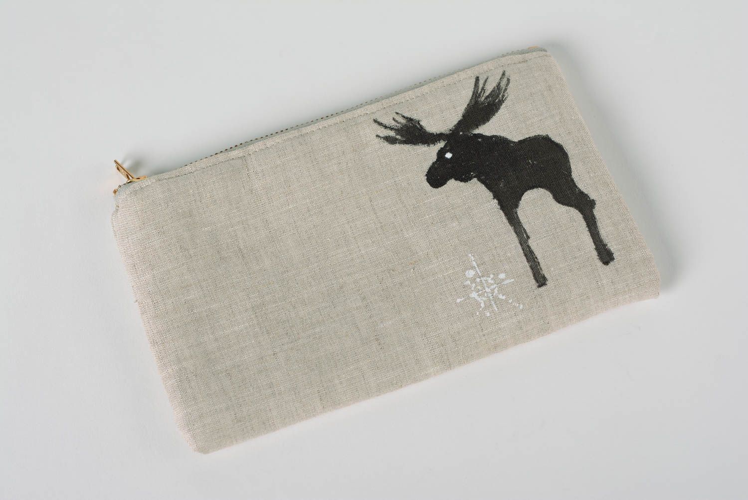 Handmade cosmetic bag sewn of gray linen fabric with zipper and elk image photo 1