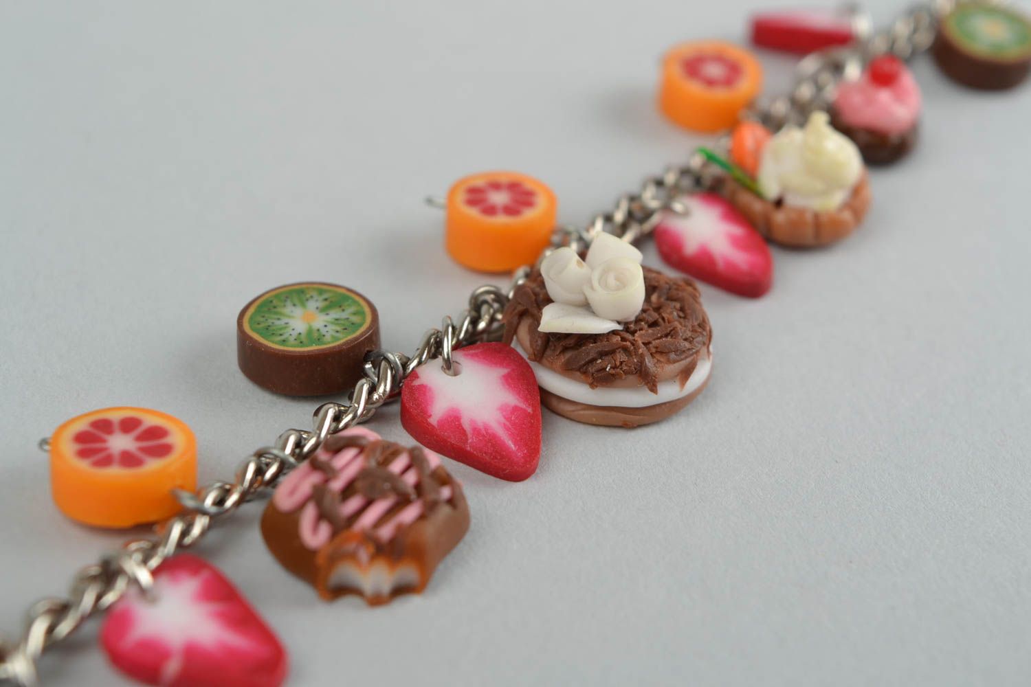 Handmade bracelet made of polymer clay on chain with decorative sweets photo 6