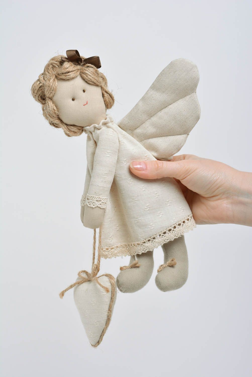 Handmade interior soft wall hanging sewn of cotton fabric Fairy in beige color photo 3