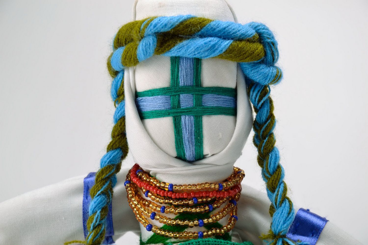 Rag doll with blue ribbons photo 3