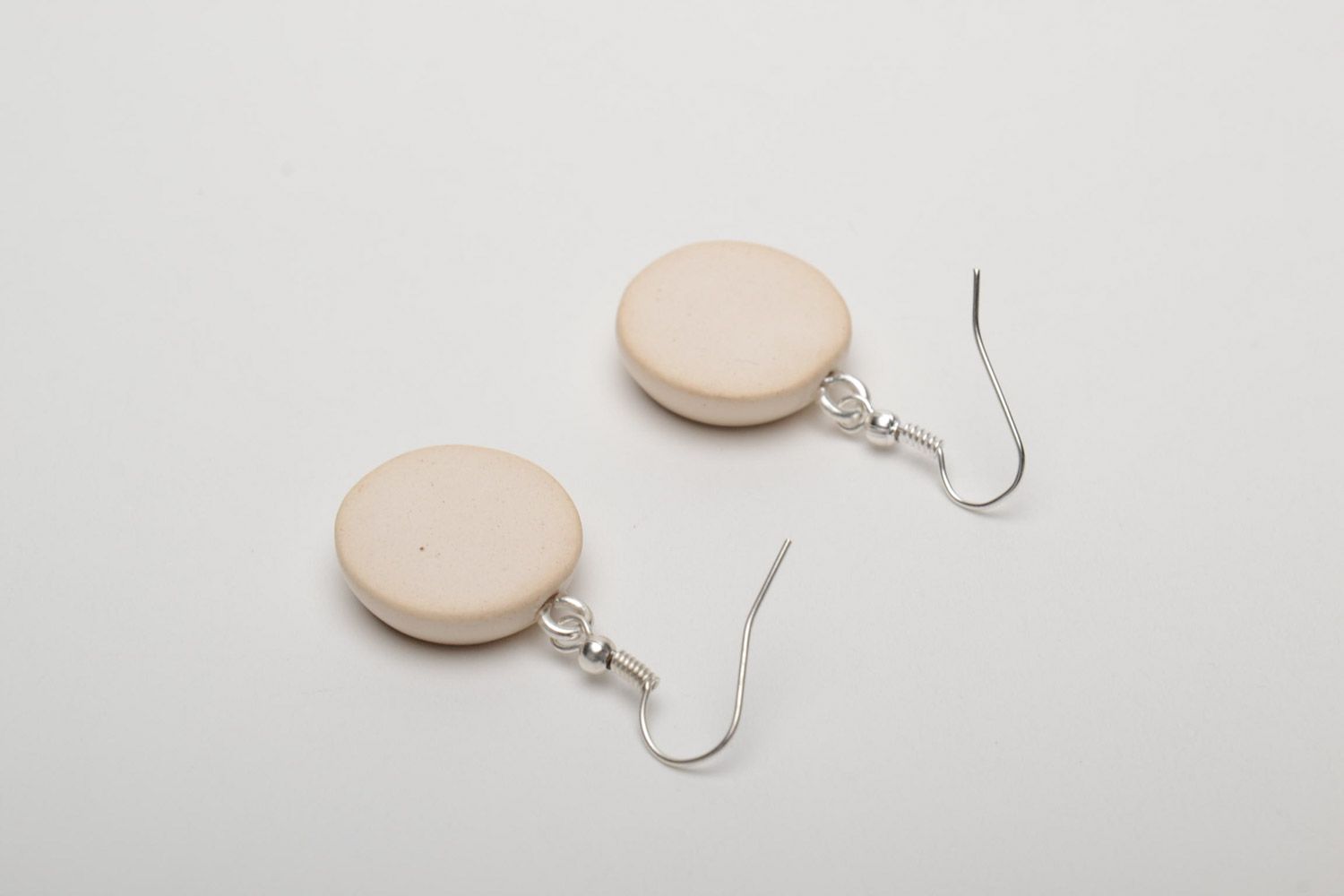 Small round earrings hand made of white clay and coated with enamel photo 4