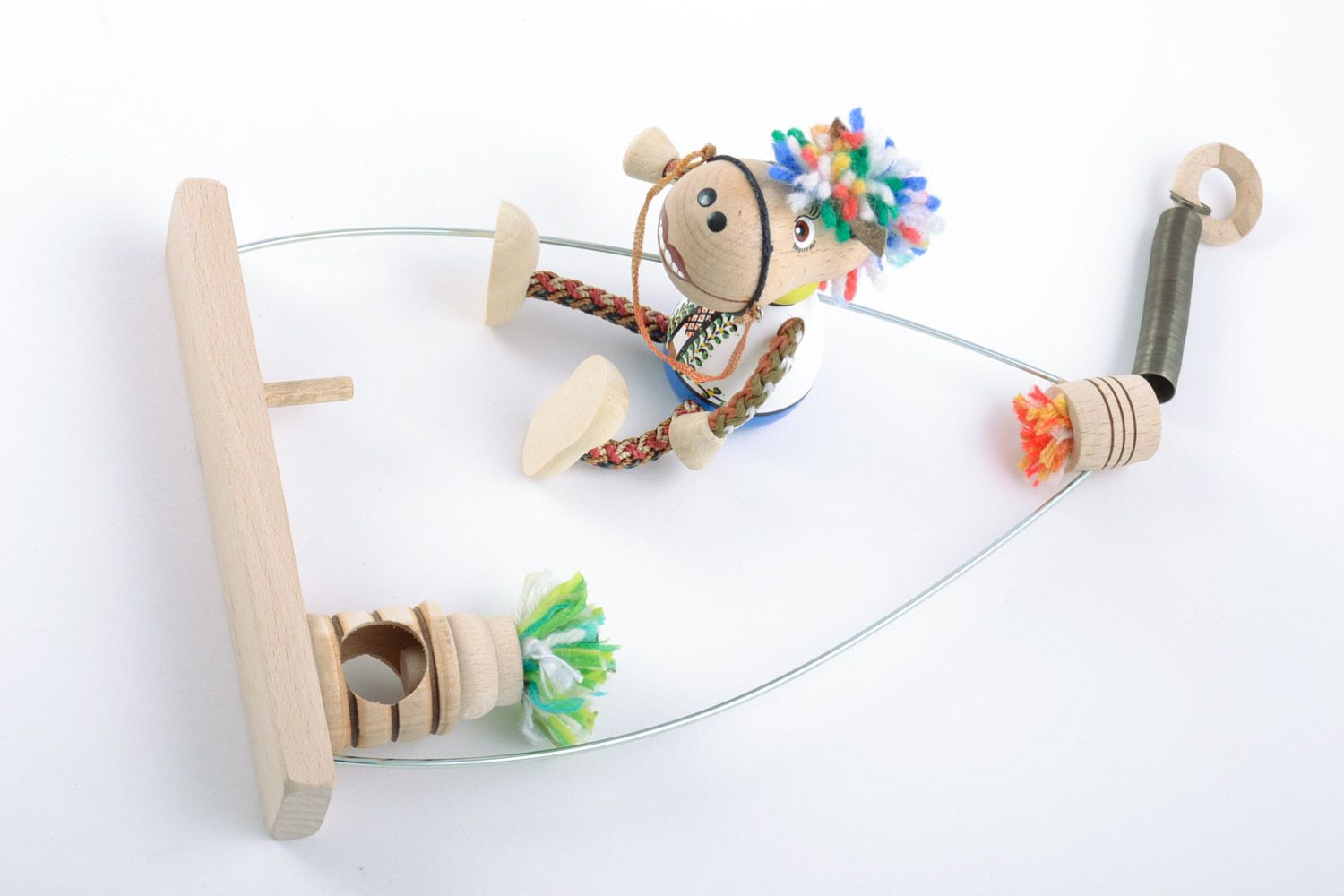 Handmade eco friendly painted wooden toy for kids and interior horse on swing photo 5
