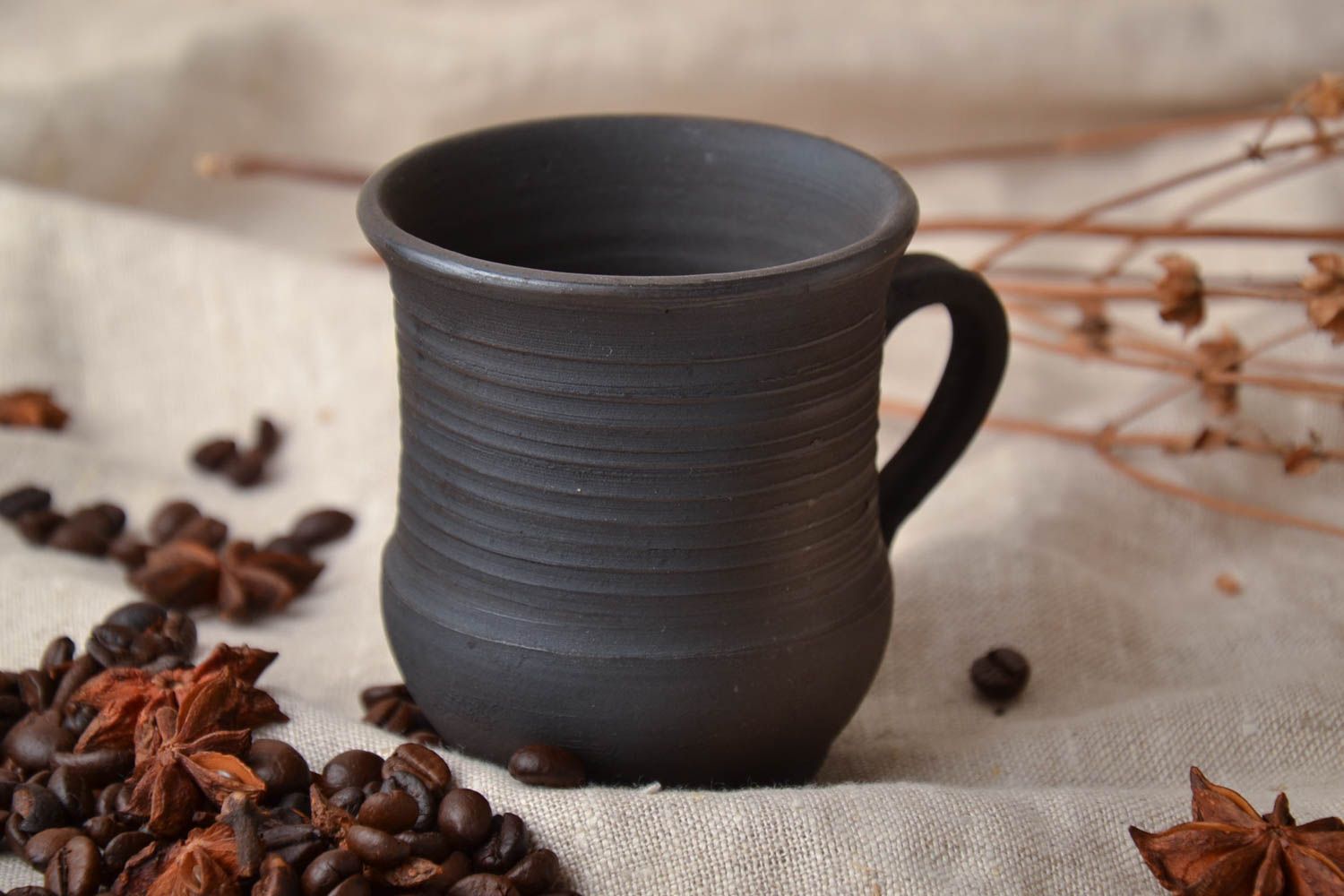 Smoked clay drinking 6 oz cup in black color and rustic style with handle photo 1
