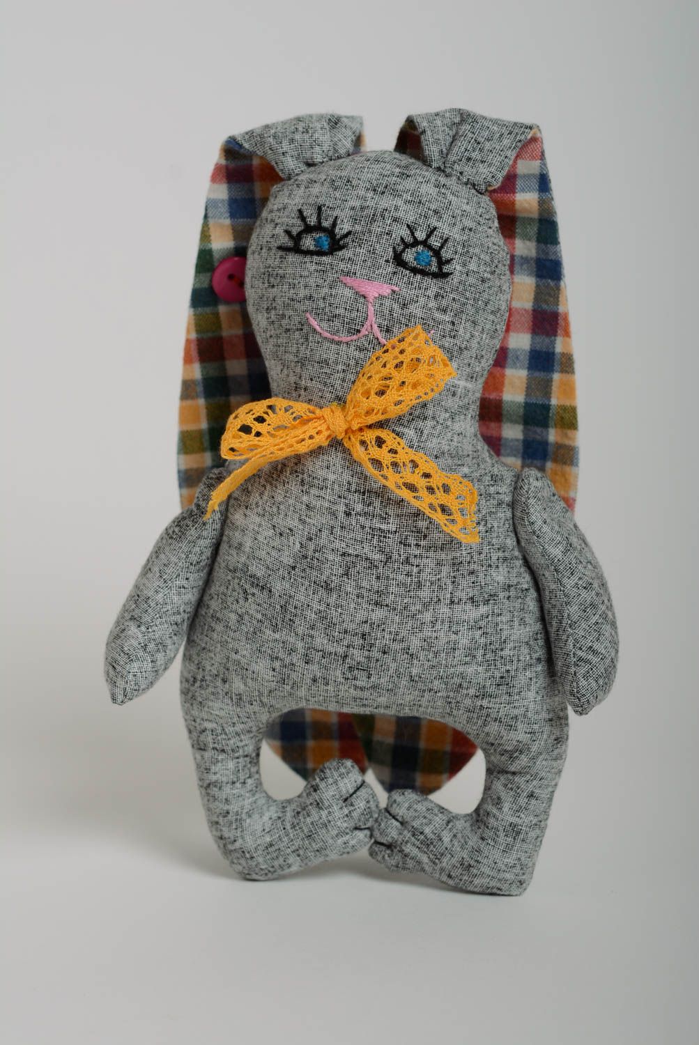 Small handmade children's fabric soft toy hare of gray color photo 1