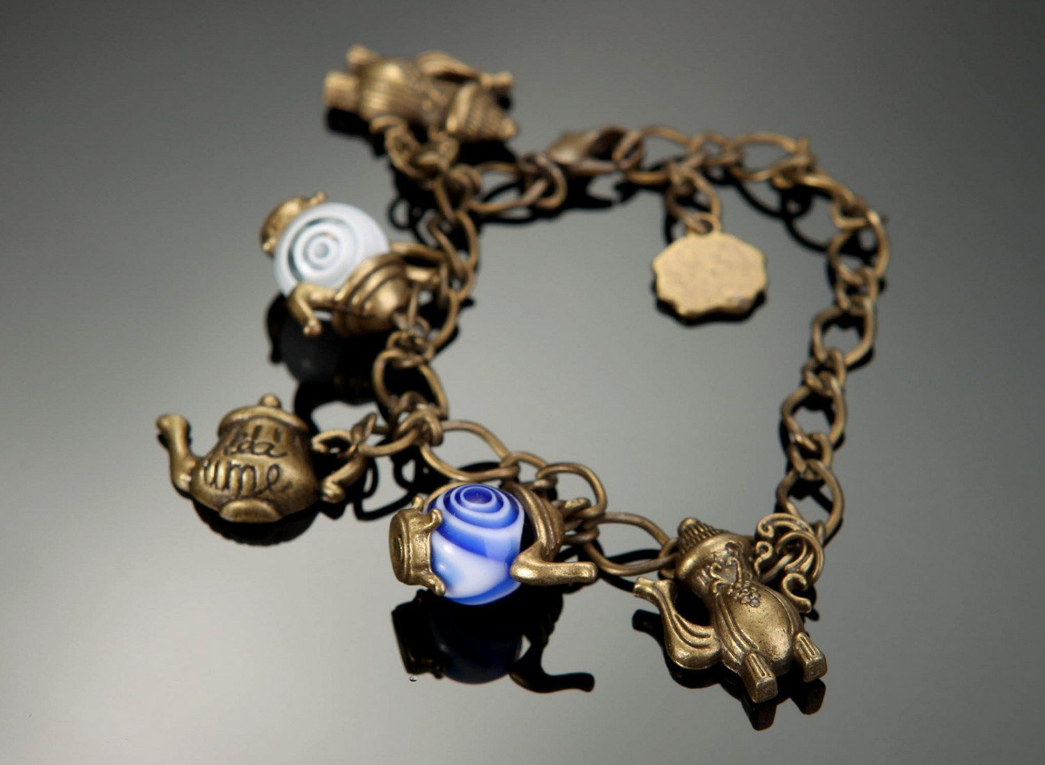 Bracelet with pendants made of bronze photo 1