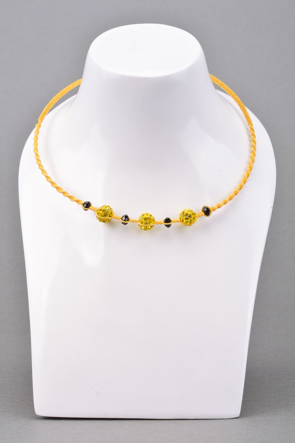 Unusual design handmade necklace woven of threads and beads of yellow color for girls photo 1
