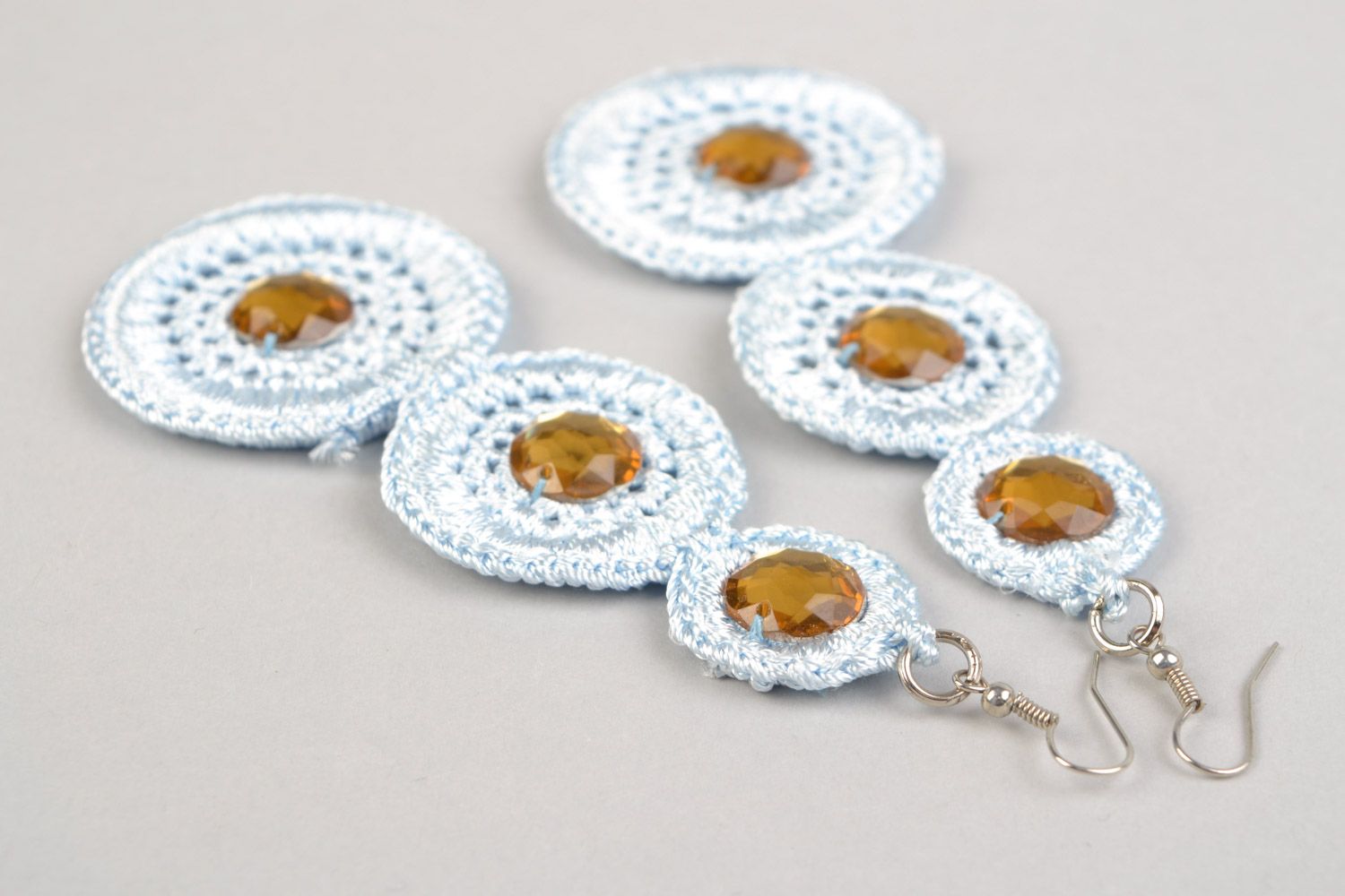 Handmade long lacy white earrings woven of viscose threads with cabochons photo 3
