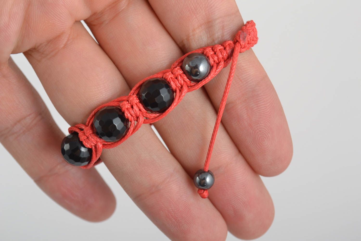 Black beads strand bracelet gemstone jewelry on red card photo 4