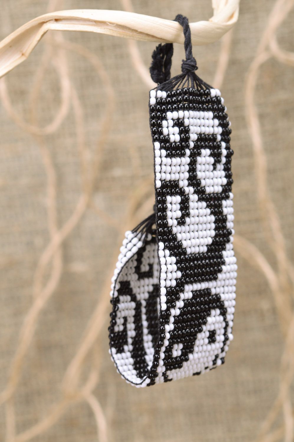 Handmade beaded wide bracelet with ties and black and white pattern photo 1