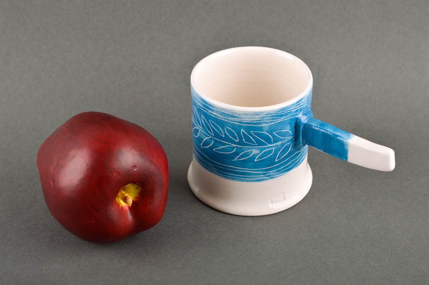 Art ceramic glazed white and blue coffee mug with stick shape handle photo 1
