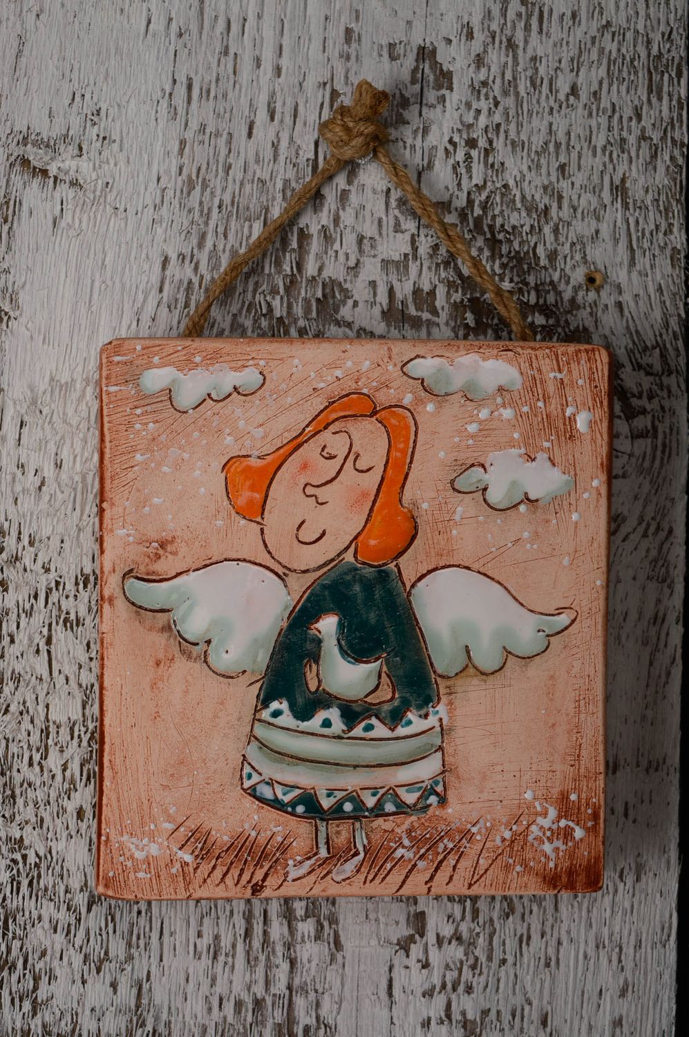 Panel de arcilla con ángel foto 1